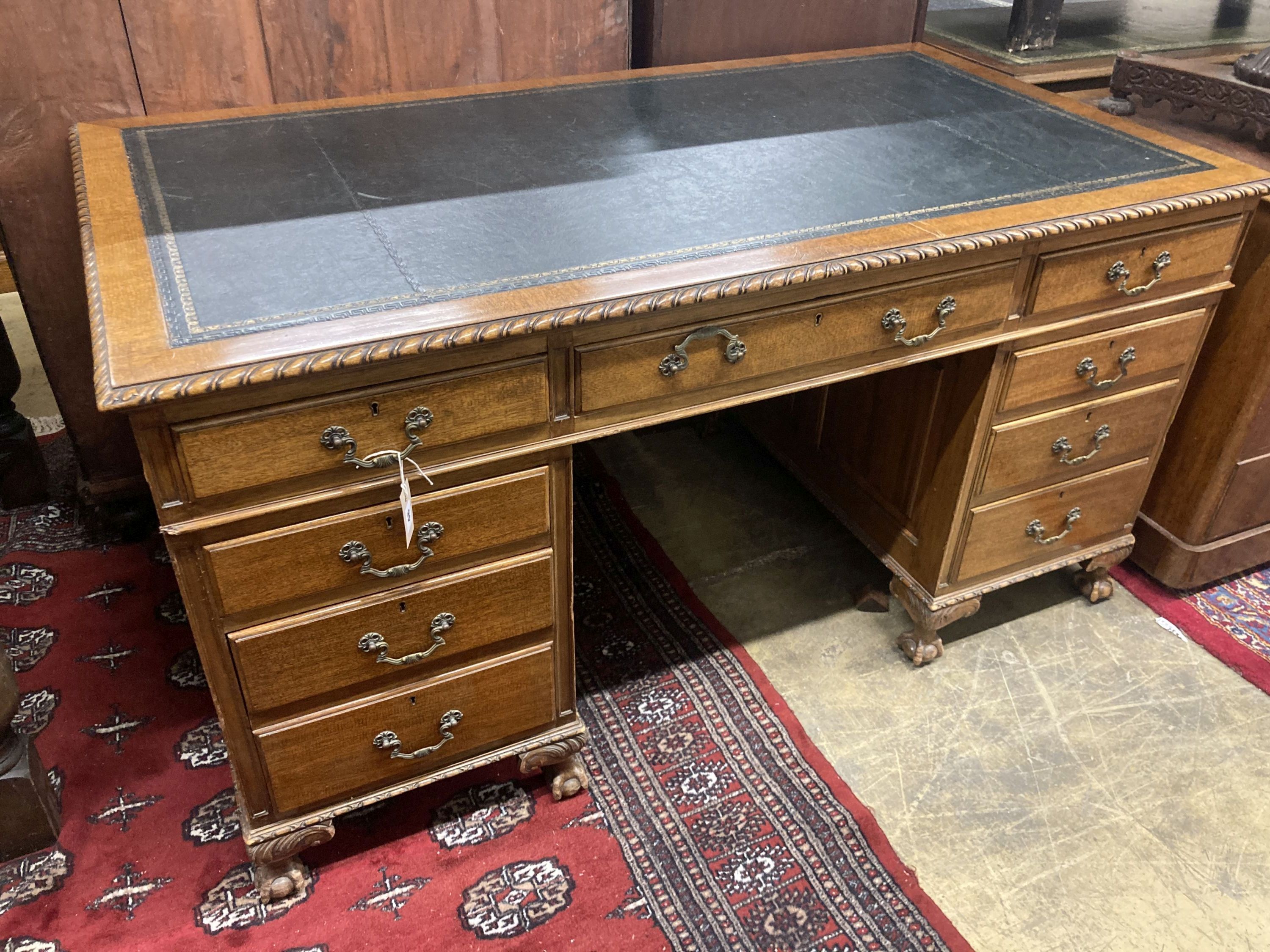 An early 20th century mahogany pedestal desk, length 152cm, depth 84cm, height 78cm